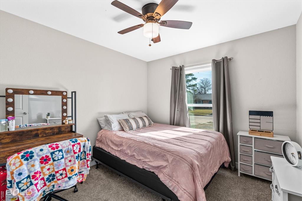 2517 Conrad Street Bossier City, LA 71111 - Photo 26 of 39 a bedroom with a bed and a window