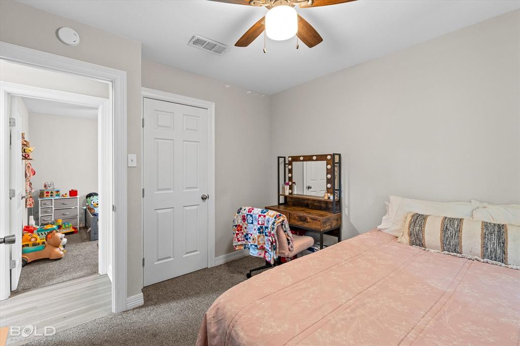 2517 Conrad Street Bossier City, LA 71111 - Photo 27 of 39 a bedroom with bed and window