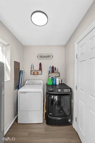 a kitchen with a stove and a refrigerator