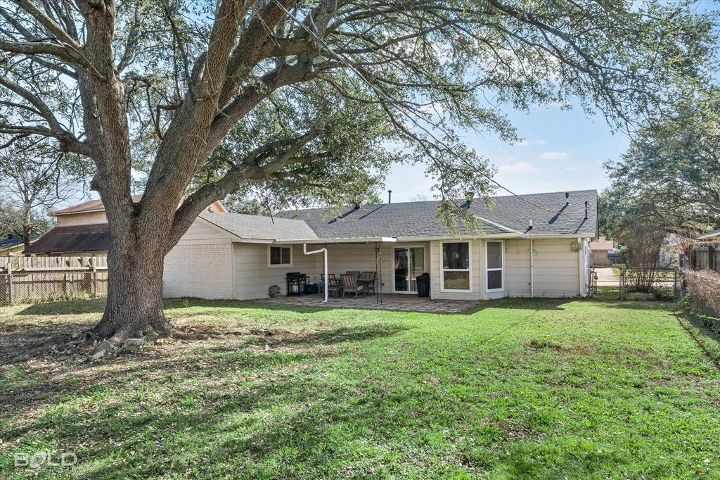 2517 Conrad Street Bossier City, LA 71111 - Photo 37 of 39 a view of a house with a yard
