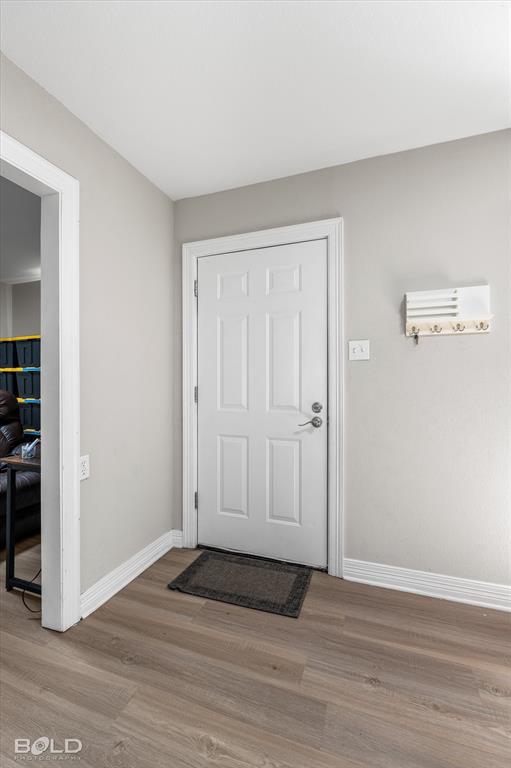 2517 Conrad Street Bossier City, LA 71111 - Photo 8 of 39 a view of an empty room and wooden floor