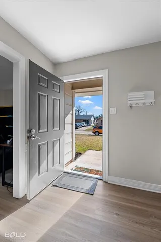 a view of an empty room and window