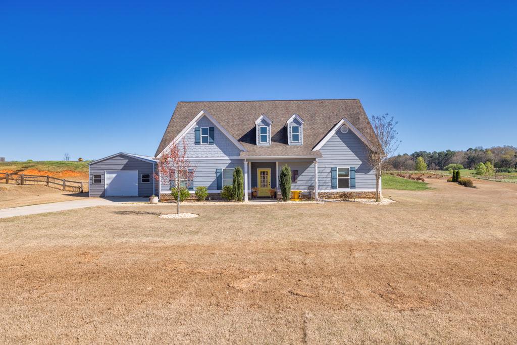1330 Sims Road Southeast Winder, GA 30680 - Photo 1 of 1 a view of house with backyard and parking