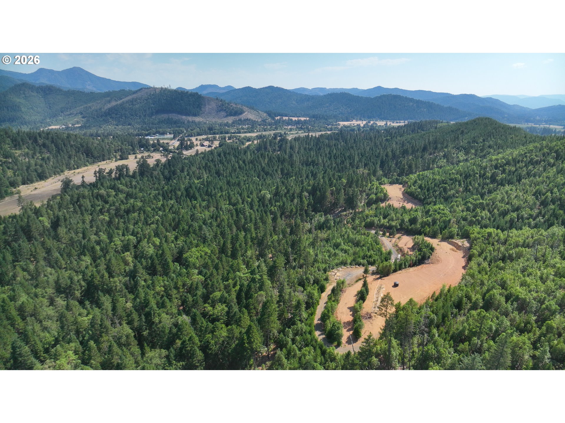 116 Crooks Creek Road Selma, OR 97538 - Photo 3 of 20 a open area with mountains in the background