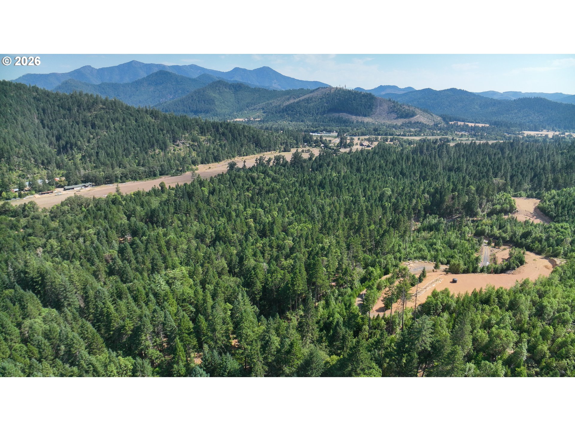 116 Crooks Creek Road Selma, OR 97538 - Photo 4 of 20 a open area with mountains in the background