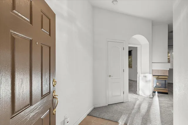 a view of a kitchen from the hallway