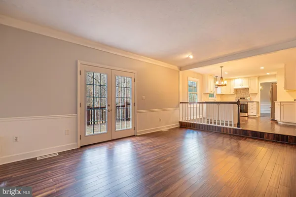 a view of a livingroom with wooden floor