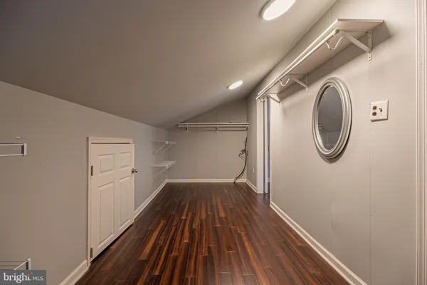 a view of empty room with washer and dryer
