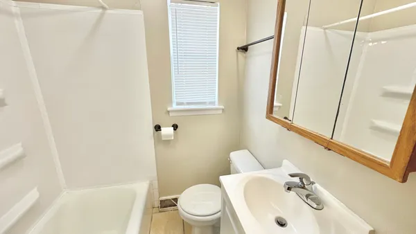 a bathroom with a sink and a toilet