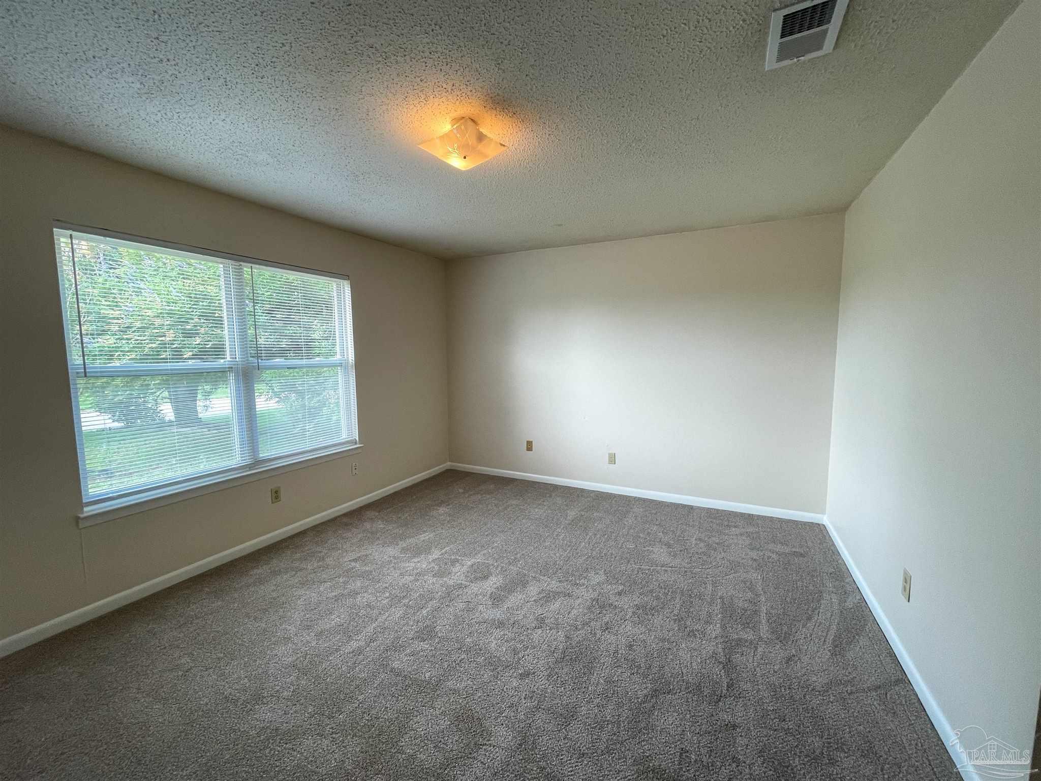 3226 Santa Rosa Drive Gulf Breeze, FL 32563 - Photo 15 of 15 an empty room with windows