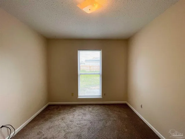 a view of a window in an empty room