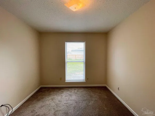a view of a window in an empty room