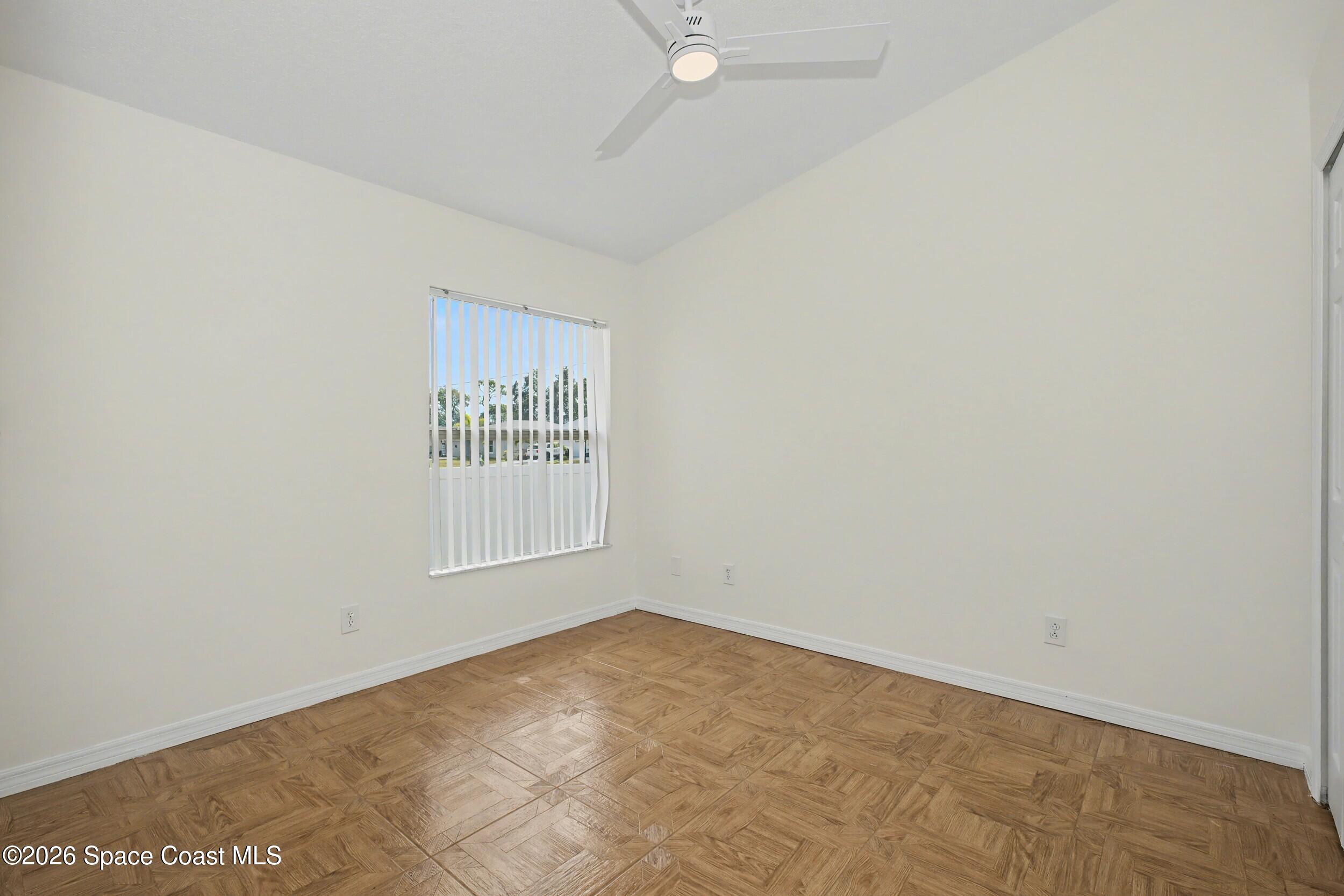 1175 Altamira Street Palm Bay, FL 32907 - Photo 23 of 37 an empty room with a window