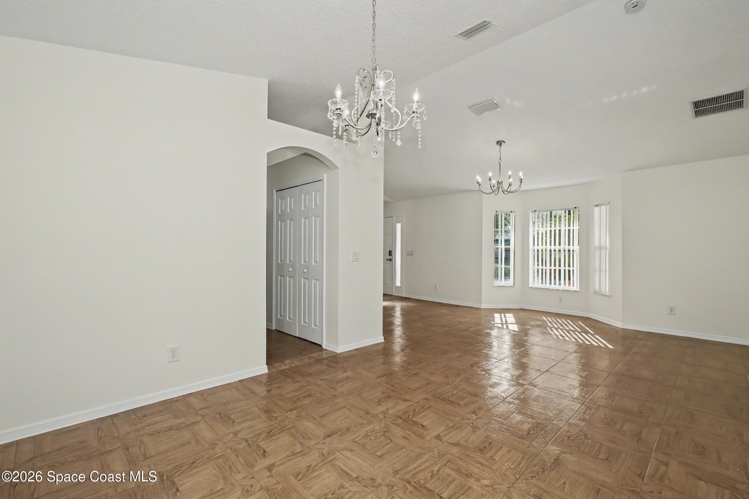 1175 Altamira Street Palm Bay, FL 32907 - Photo 7 of 37 a view of an empty room with window