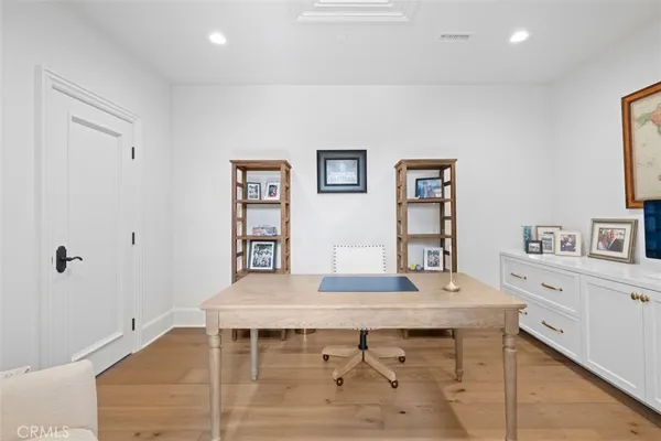 a view of a workspace with furniture