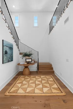 a view of entryway with wooden floor