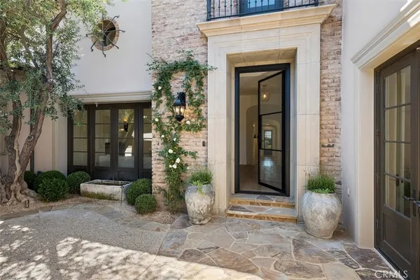 a living room with furniture fireplace and a flat screen tv