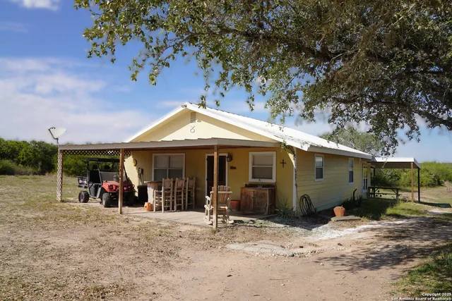 a view of a house with a patio