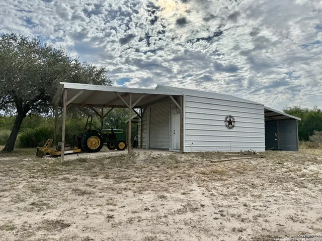 a house with trees in the background