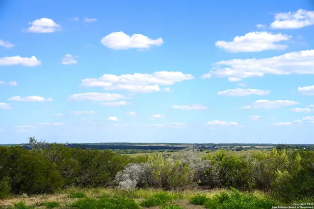 a view of a lake with sunset view
