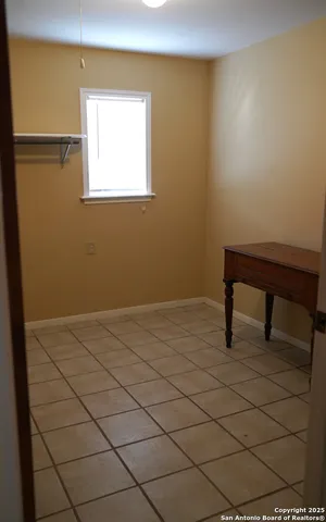 a view of a room with a window