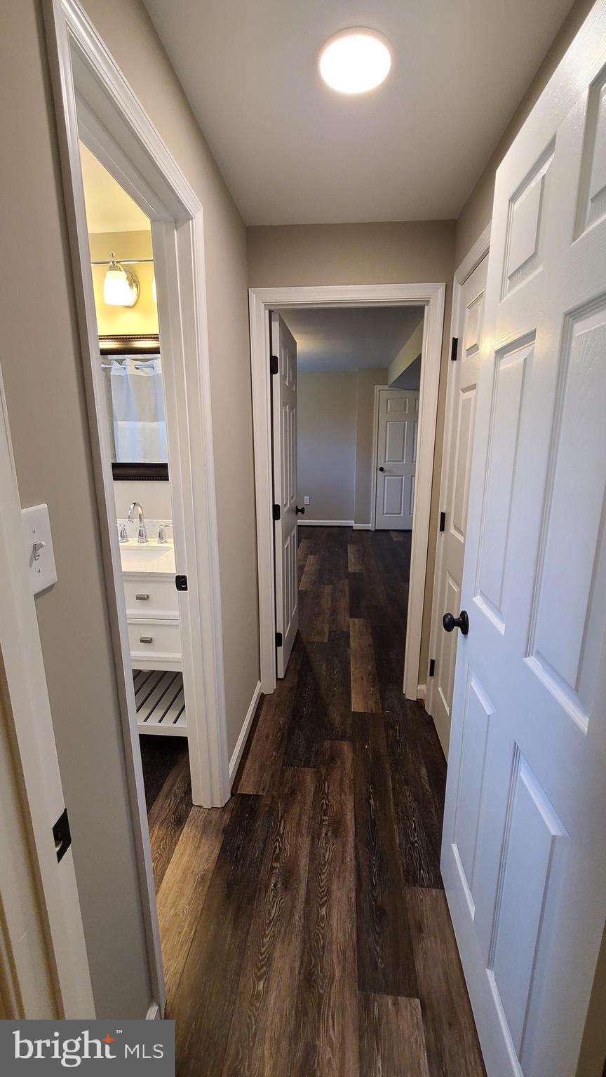 7 Cedar Drive Sterling, VA 20164 - Photo 17 of 40 a bathroom with a sink and a mirror