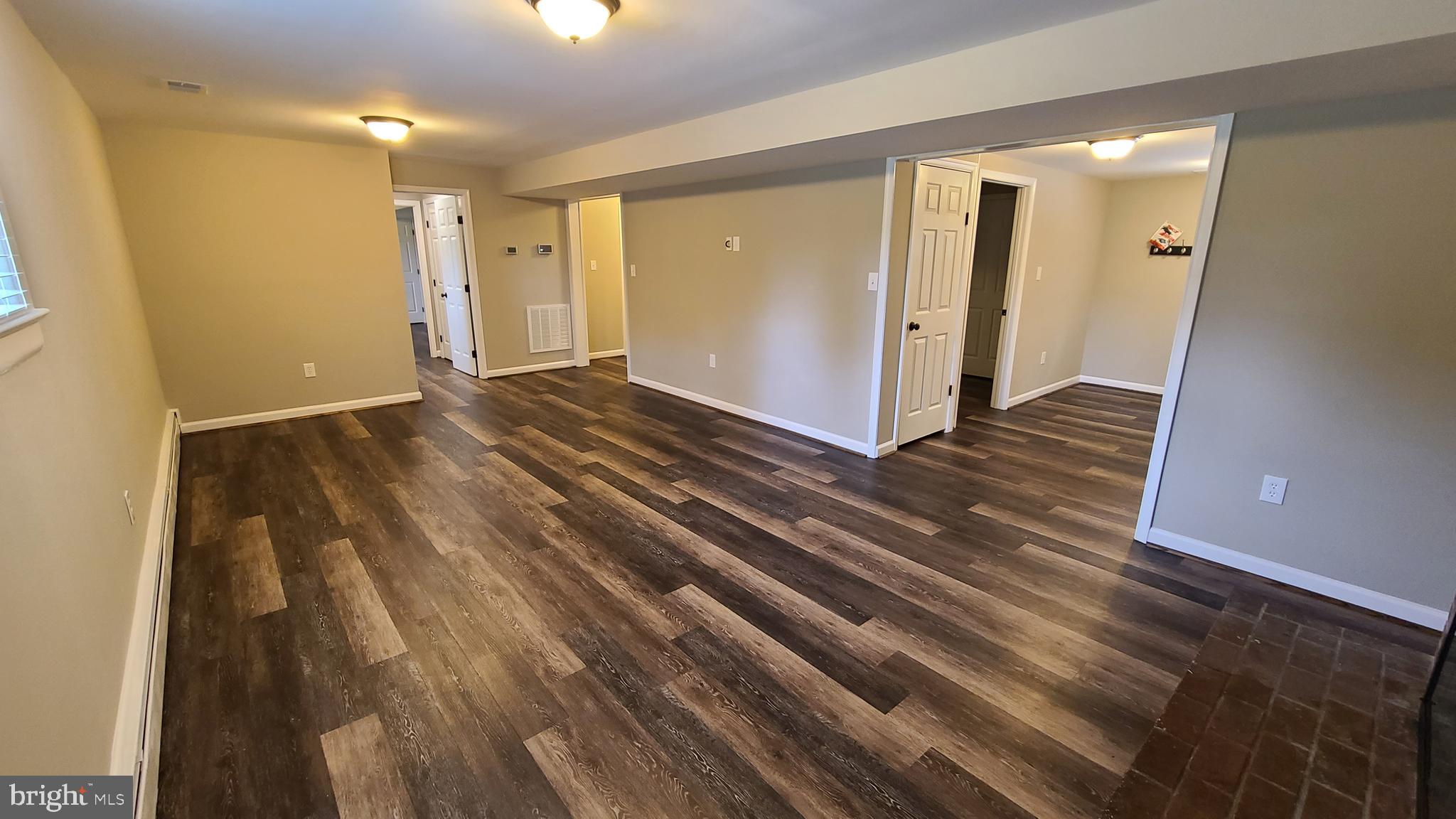 7 Cedar Drive Sterling, VA 20164 - Photo 19 of 40 a view of a room with wooden floor
