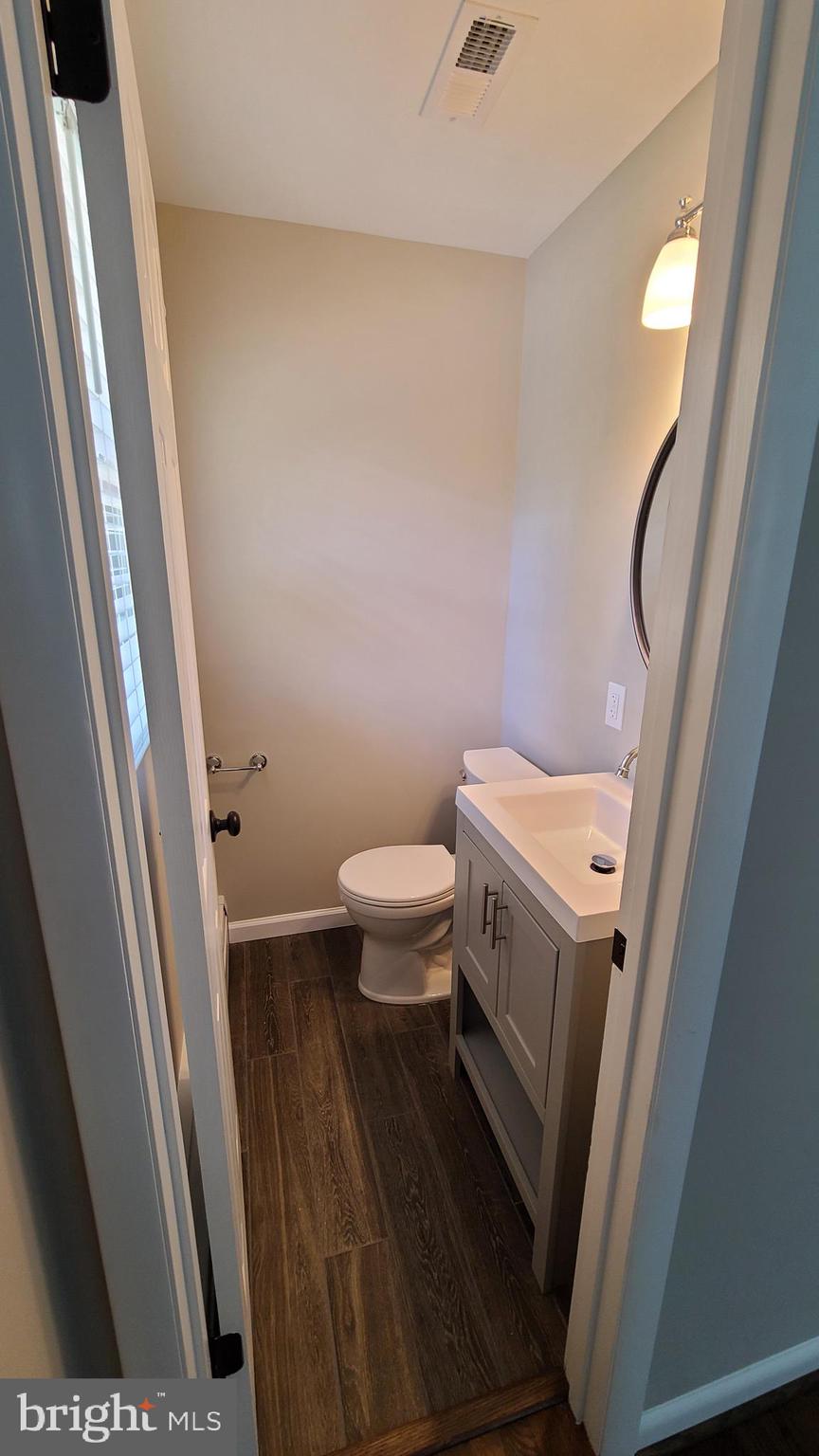 7 Cedar Drive Sterling, VA 20164 - Photo 30 of 40 a bathroom with a sink and a toilet