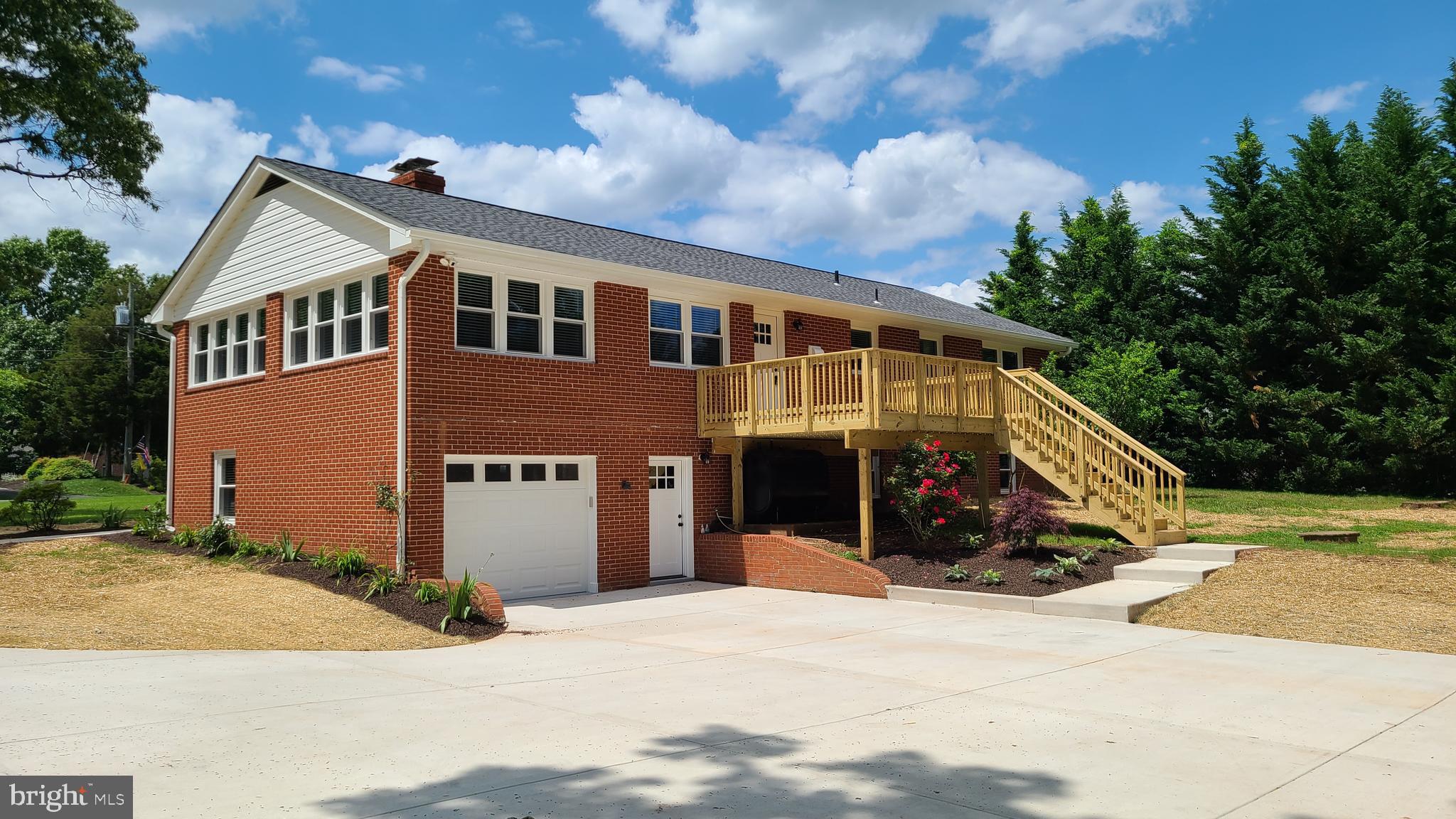7 Cedar Drive Sterling, VA 20164 - Photo 38 of 40 a front view of a house with a yard