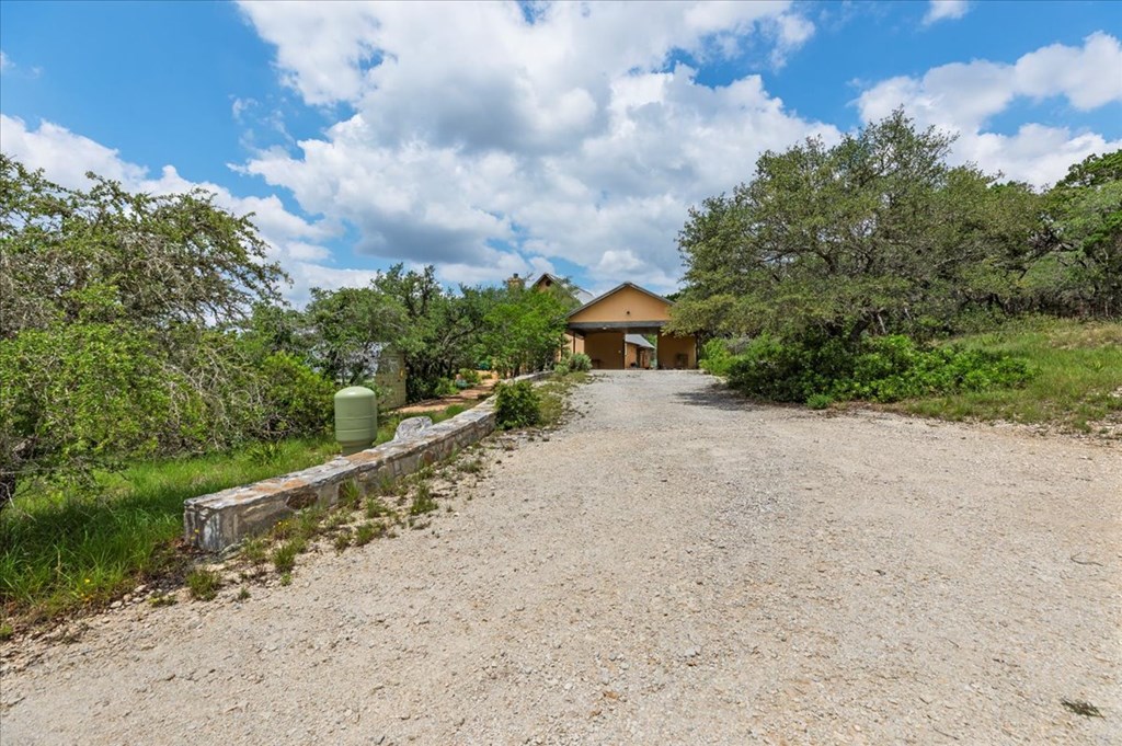 4946 Ranch Road Dripping Springs, TX 78620 - Photo 53 of 64 Drive way to carport