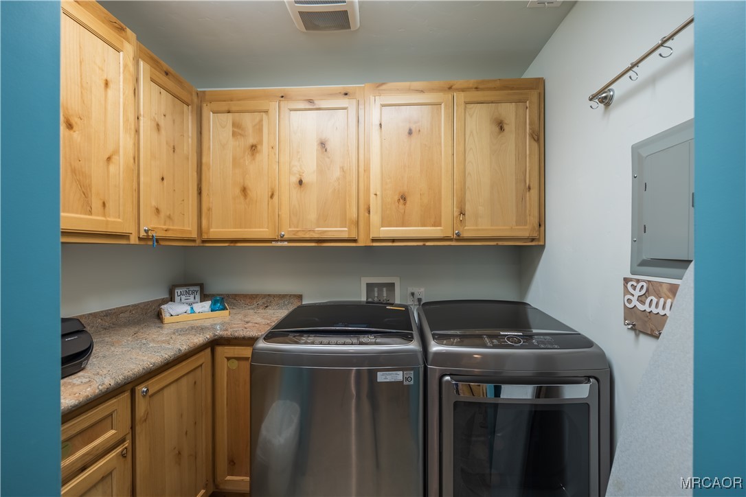 448 Edgemoor Road Big Bear Lake, CA 92315 - Photo 33 of 42 a utility room with stainless steel appliances a sink and cabinets