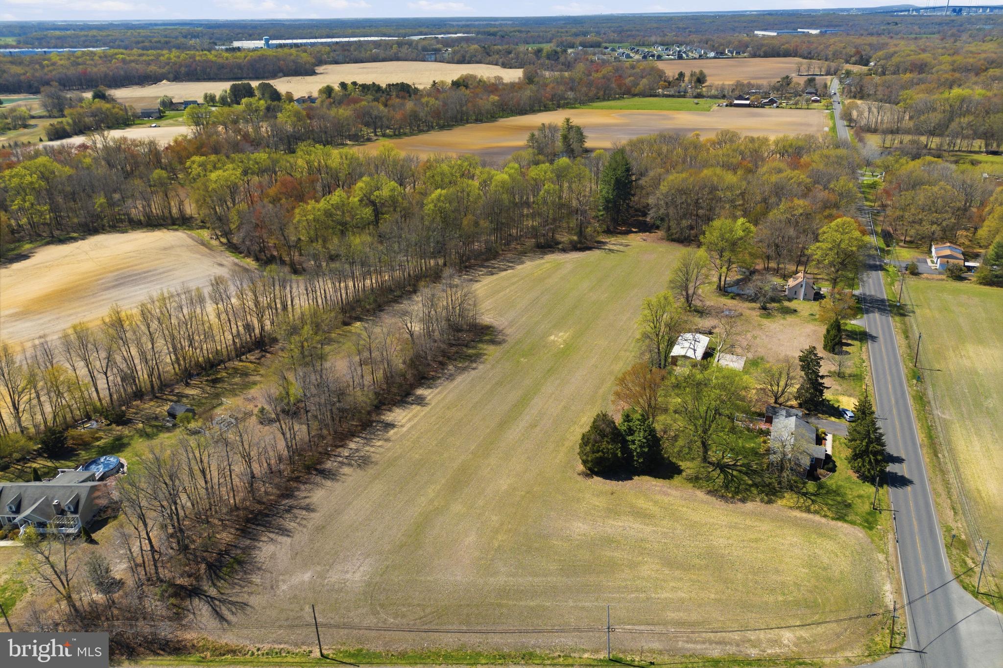 185 North Pennsville Auburn Road Carneys Point, NJ 08069 - Photo 3 of 3 a view of a lake with a mountain