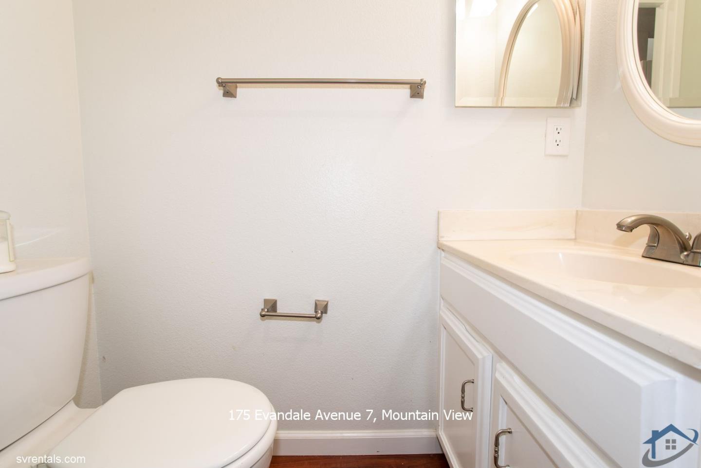 175 Evandale Avenue, Unit 7 Mountain View, CA 94043 - Photo 11 of 20 a bathroom with a sink a toilet and a mirror