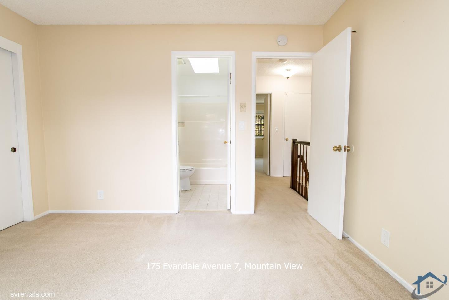 175 Evandale Avenue, Unit 7 Mountain View, CA 94043 - Photo 18 of 20 a view of a hallway with wooden shelves
