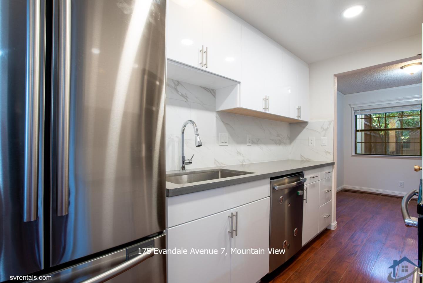 175 Evandale Avenue, Unit 7 Mountain View, CA 94043 - Photo 4 of 20 a kitchen with a sink and a refrigerator