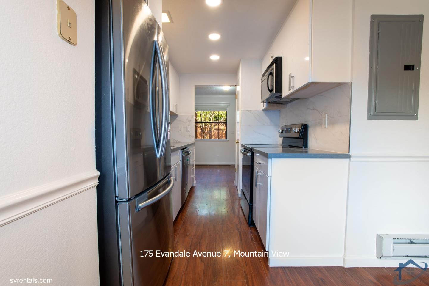 175 Evandale Avenue, Unit 7 Mountain View, CA 94043 - Photo 5 of 20 a view of a hallway with wooden floor