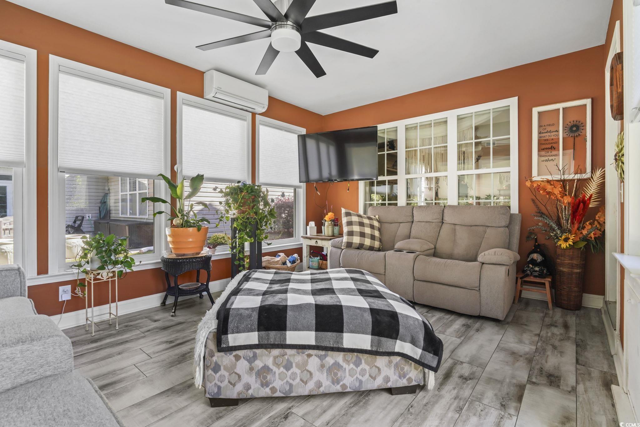 4105 Eva Bay Drive Murrells Inlet, SC 29576 - Photo 19 of 40 Sunroom / solarium featuring a wall mounted air conditioner