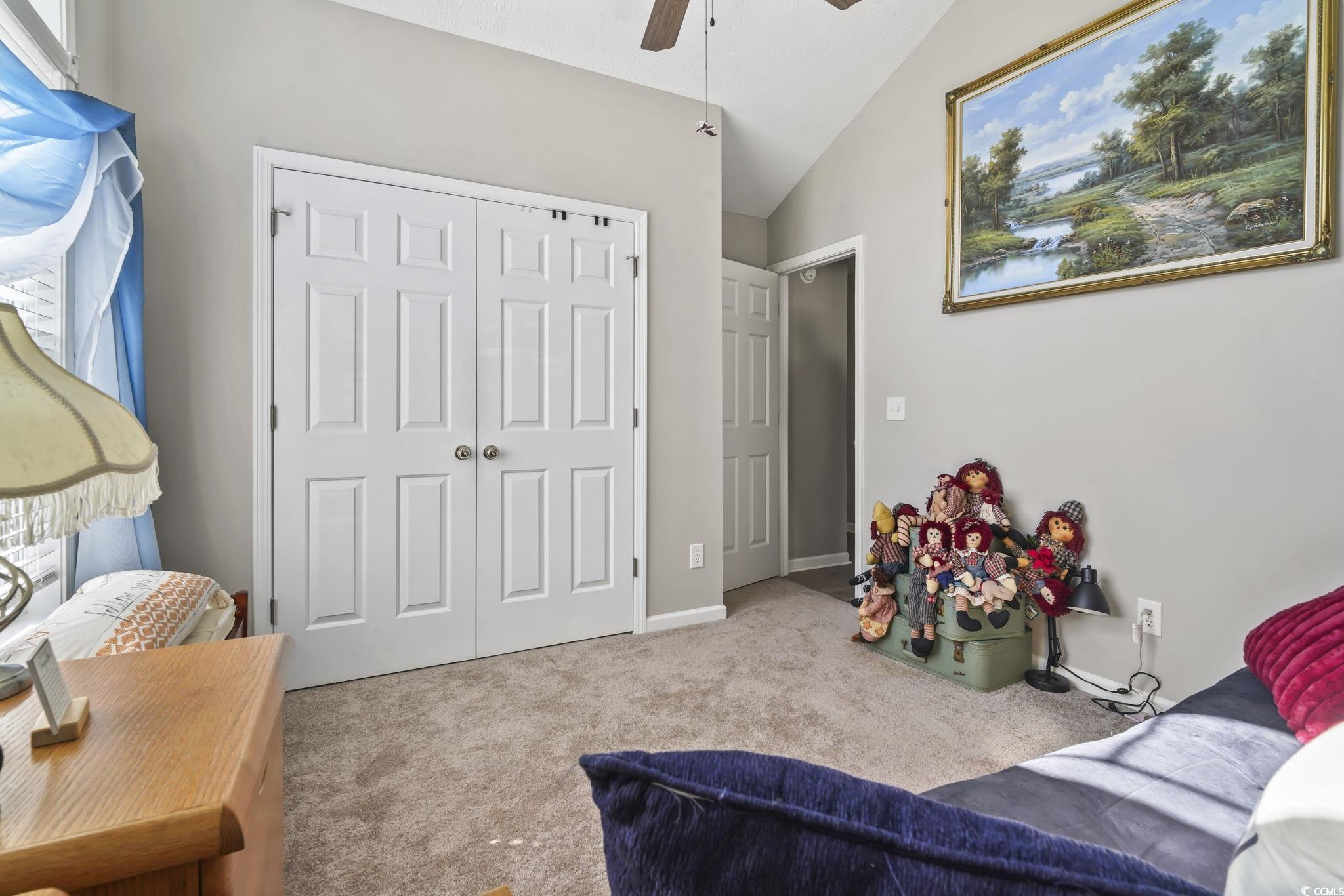 4105 Eva Bay Drive Murrells Inlet, SC 29576 - Photo 29 of 40 Bedroom with lofted ceiling, carpet, a closet, and a ceiling fan