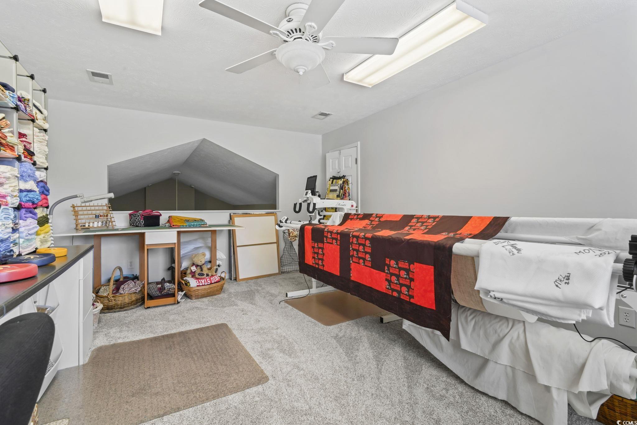 4105 Eva Bay Drive Murrells Inlet, SC 29576 - Photo 32 of 40 Bedroom featuring light colored carpet and a ceiling fan