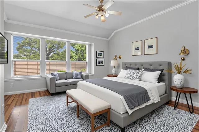 a bedroom with a bed and a couch