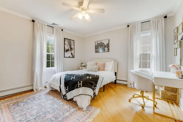 a bed room with a bed and a mirror