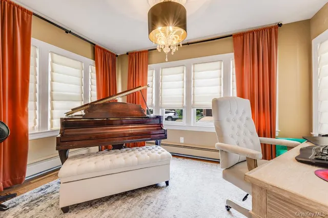 a living room with furniture and a window