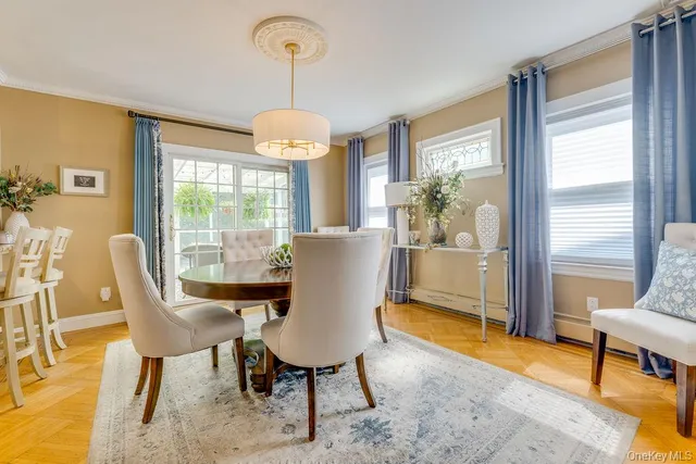 a view of a dining room with furniture window and outside view