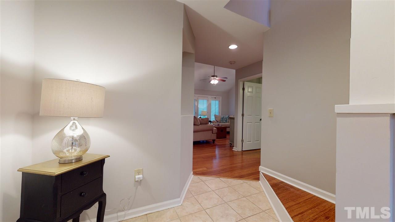 3827 Carnegie Lane Raleigh, NC 27612 - Photo 2 of 30 a view of living room and bedroom
