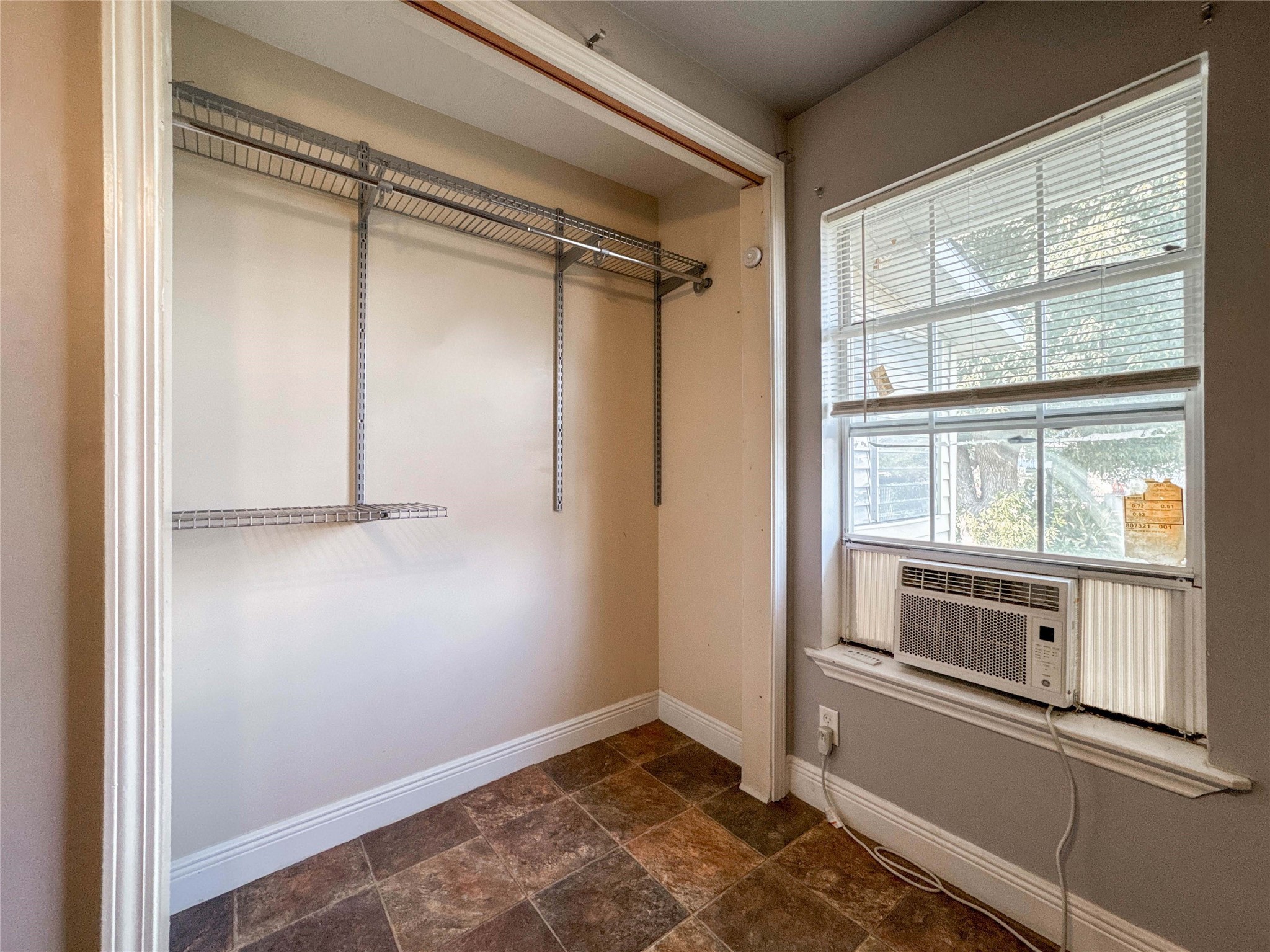 8321 Leander Street Houston, TX 77012 - Photo 12 of 23 a view of storage and utility room with washer and dryer