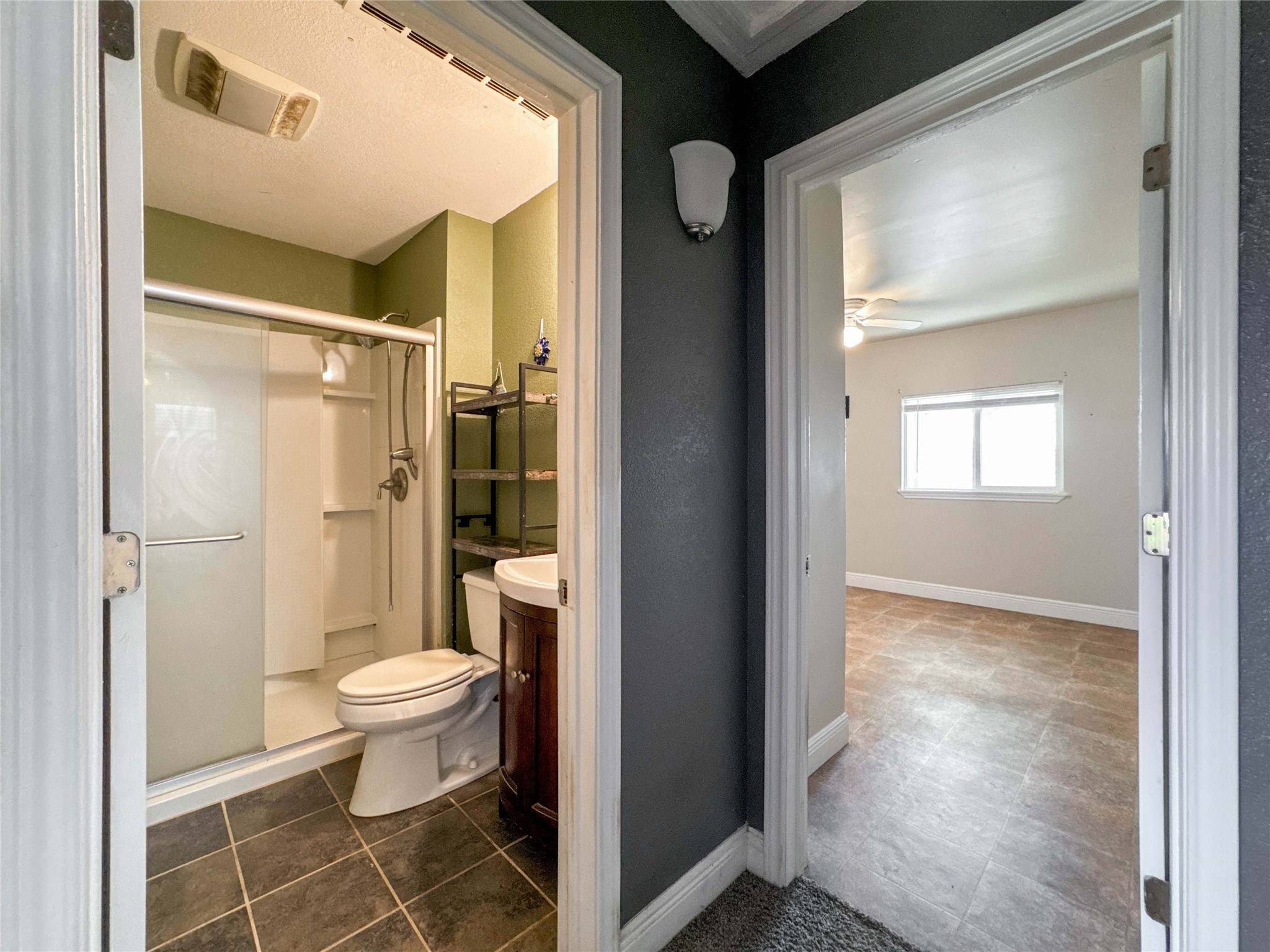 8321 Leander Street Houston, TX 77012 - Photo 18 of 23 a bathroom with a toilet and a shower