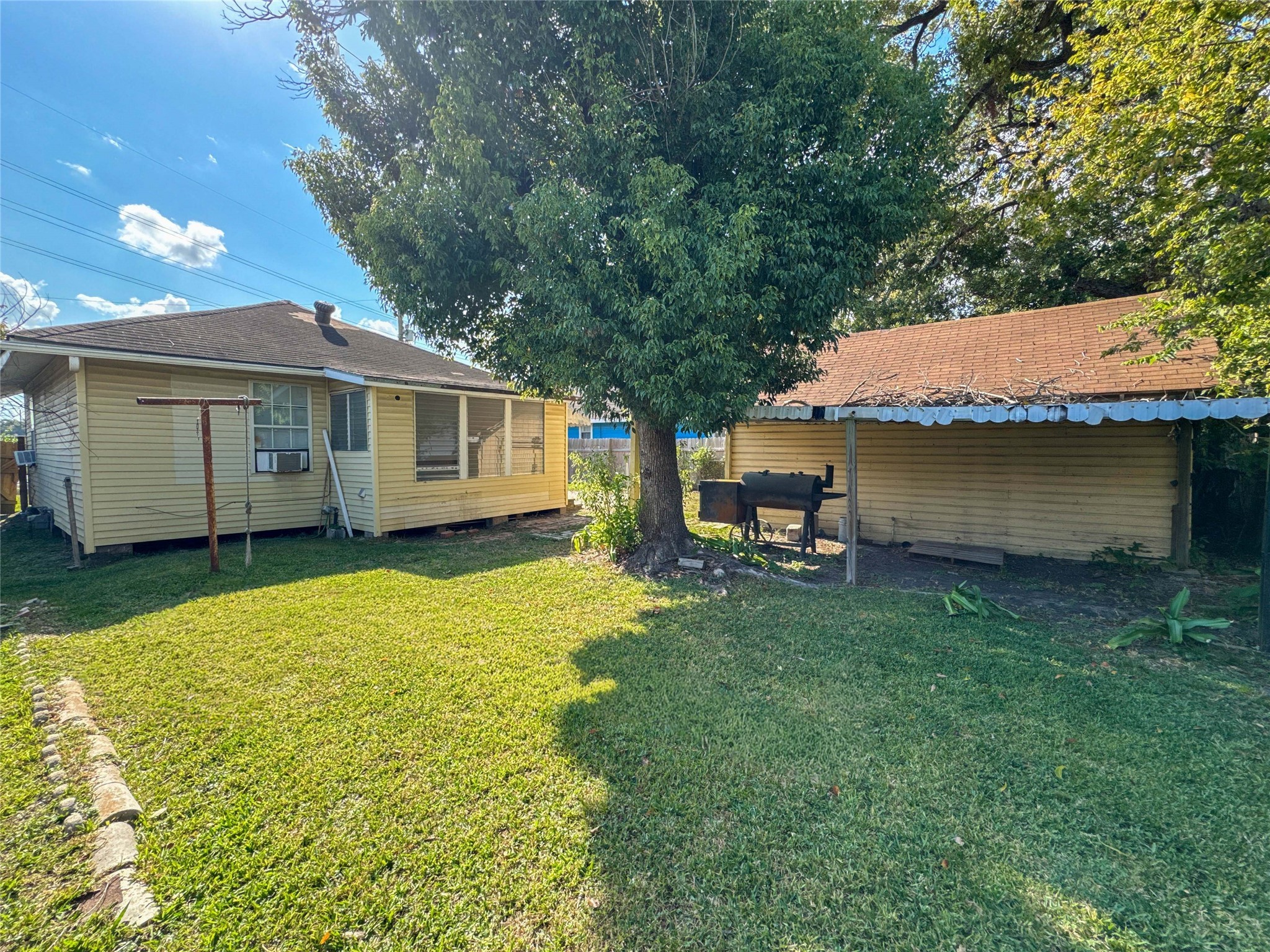 8321 Leander Street Houston, TX 77012 - Photo 21 of 23 a view of a house with a backyard
