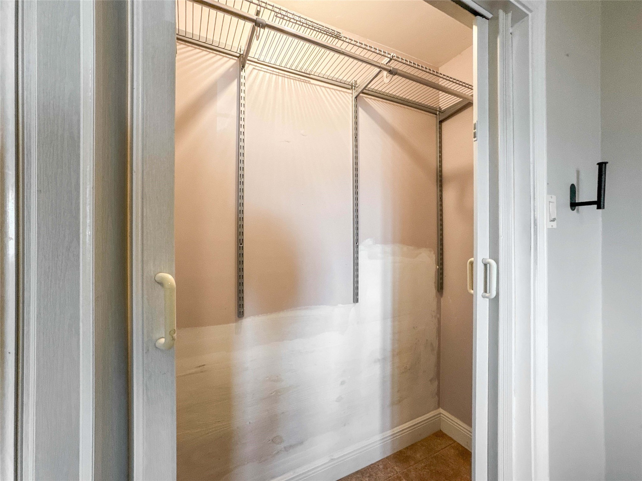 8321 Leander Street Houston, TX 77012 - Photo 10 of 23 a bathroom with a glass shower door