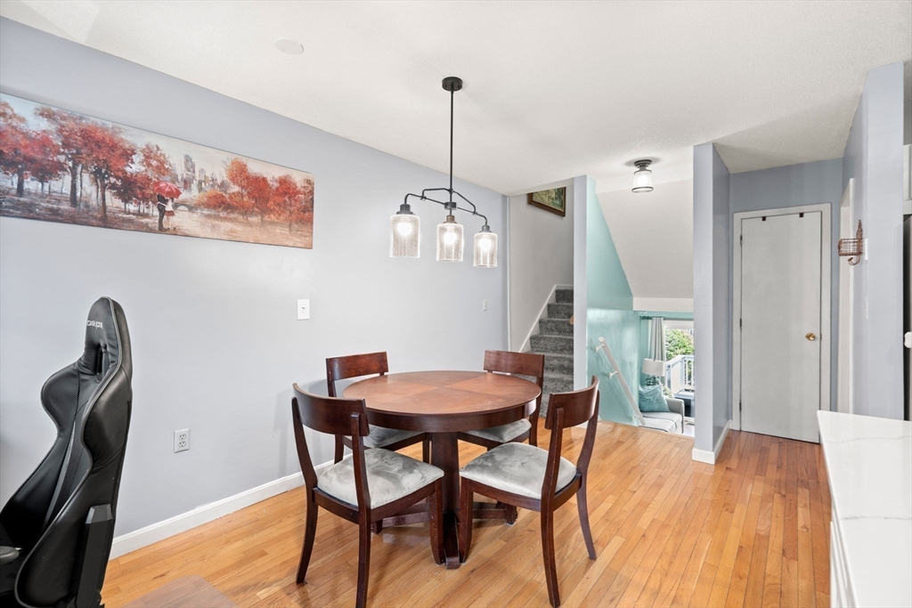 2 Halsey Way, Unit 40C Salem, MA 01970 - Photo 9 of 19 a dining room with furniture and window