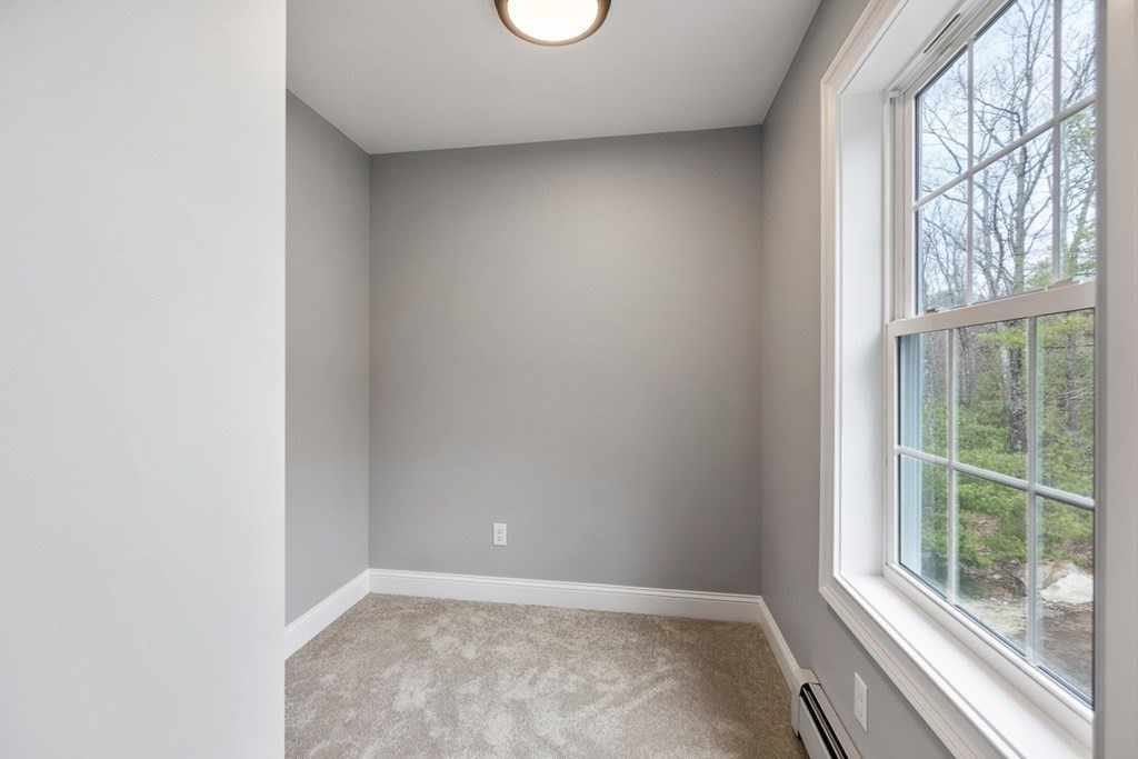 1499 South Athol Road Athol, MA 01331 - Photo 15 of 21 a view of an empty room with a window